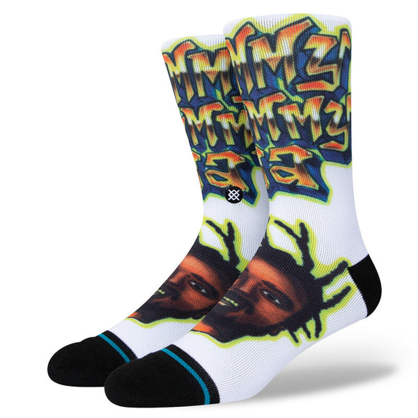 A pair of STANCE socks SHIMMY SHIMMY YA LARGE with a graffiti-inspired design and a printed face on the ankles.
