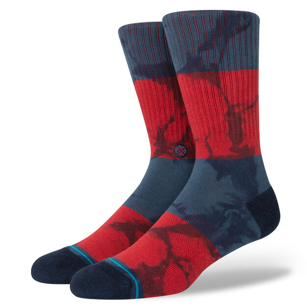 A pair of STANCE ASSURANCE NAVY LARGE socks.