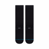 A pair of STANCE SOCKS ICON BLACK LARGE with the word flup on it.
