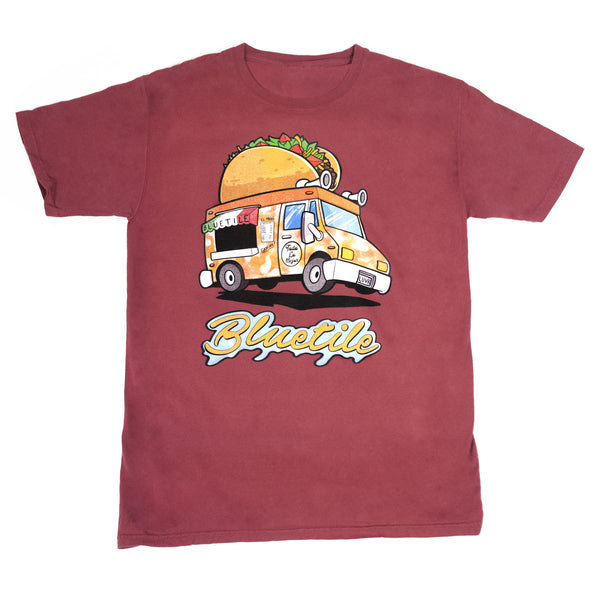 A BLUETILE MUNCHIES TACO TRUCK T-SHIRT CAYAN with an image of a taco truck, by Bluetile Skateboards.