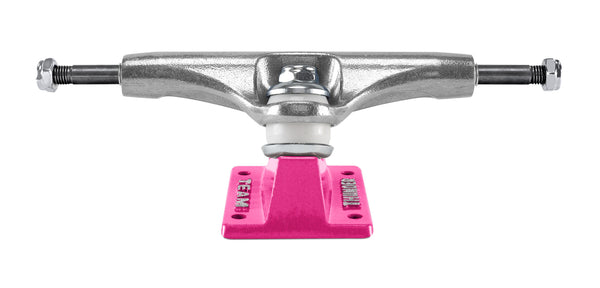 A THUNDER DONOVAN SCRAM SKULL 148 skateboard truck with a pink base plate.