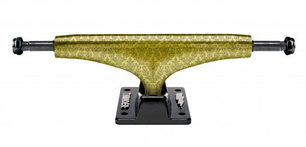 A yellow and black THUNDER skateboard truck on a black background.