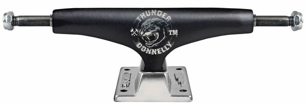 A Thunder skateboard truck with the logo "THUNDER TRUCKS DONNELLY SAVE IT LIGHTS (SET OF TWO)" on it.