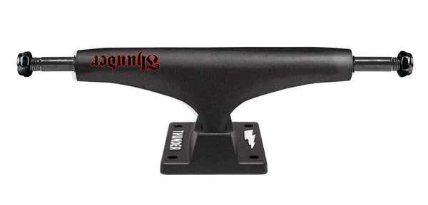 A THUNDER black skateboard truck with a red logo of THUNDER TRUCKS on it.
