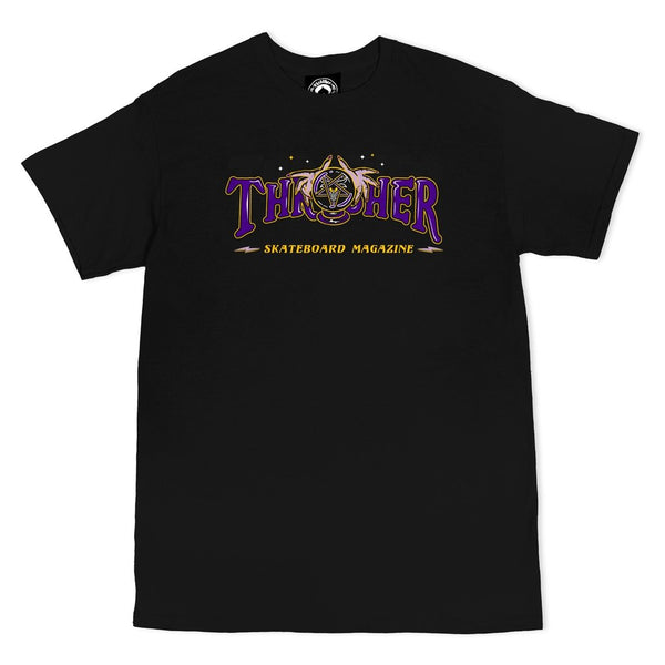 The THRASHER FORTUNE LOGO TEE BLACK by THRASHER showcases a bold purple and gold Thrasher Skateboard Magazine Fortune logo on the front.