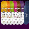 A row of REAL skateboards with SKATE SHOP DAY 2023 DECK designs on them.