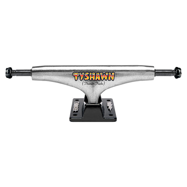 a THUNDER skateboard with the word taiwan on it.