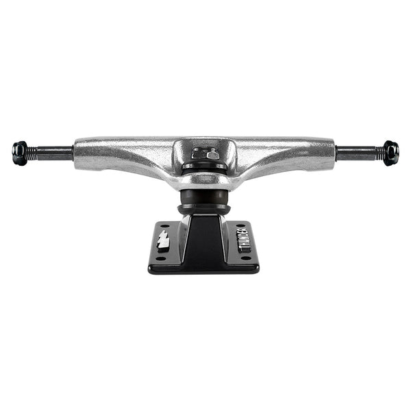 A silver THUNDER skateboard with a black base.