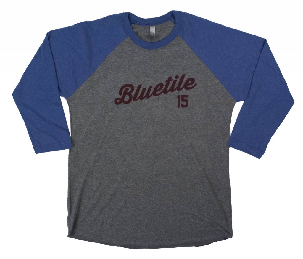 A BLUETILE 15 YEARS RAGLAN ROYAL / GREY t-shirt with the word Bluetie Skateboards on it.