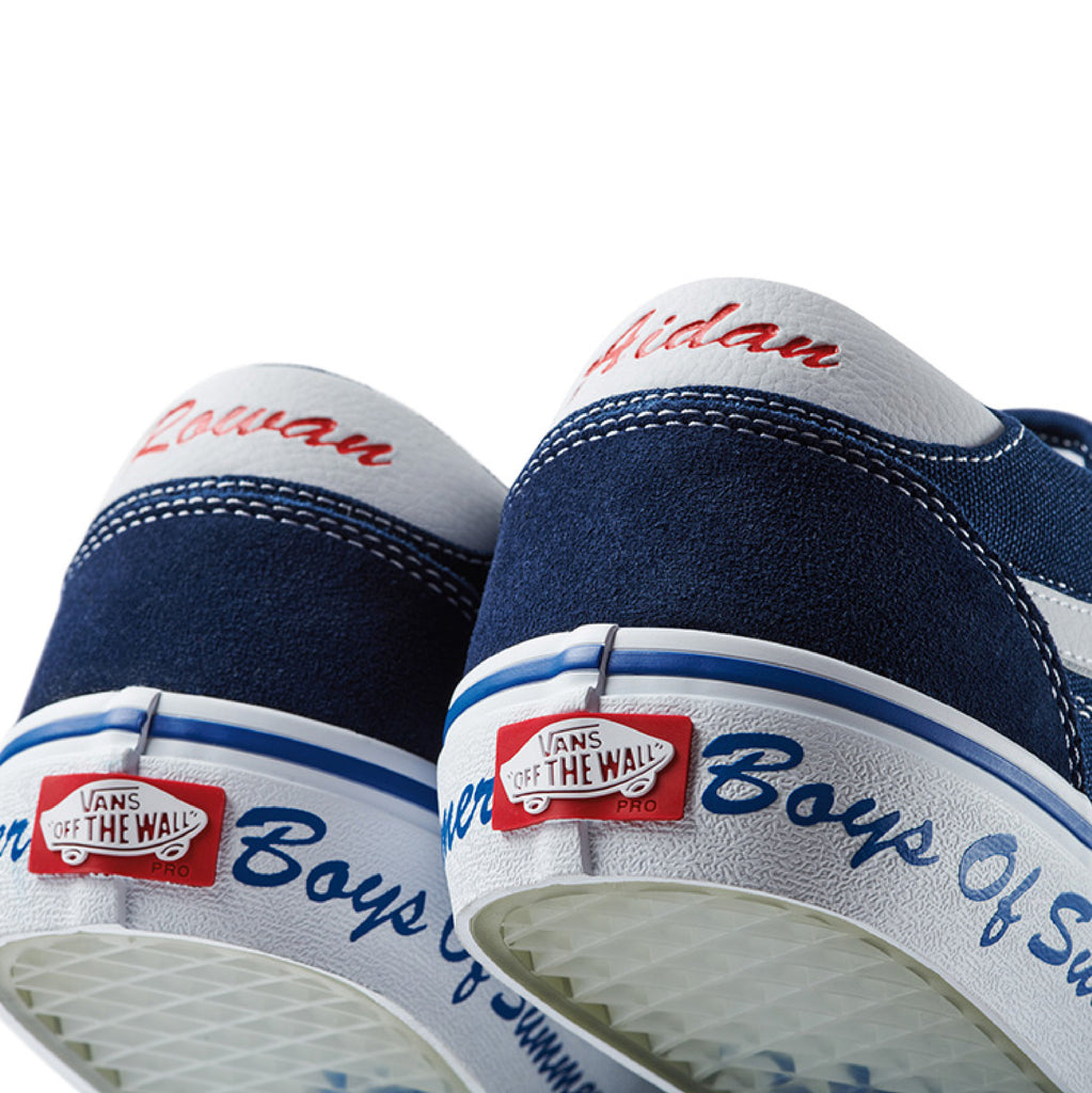 A pair of blue and white VANS BOYS OF SUMMER ROWAN PRO LTD AIDEN shoes.