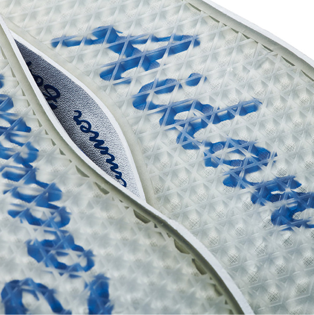 A close-up of a pair of VANS BOYS OF SUMMER ROWAN PRO LTD AIDEN shoes with writing on them.