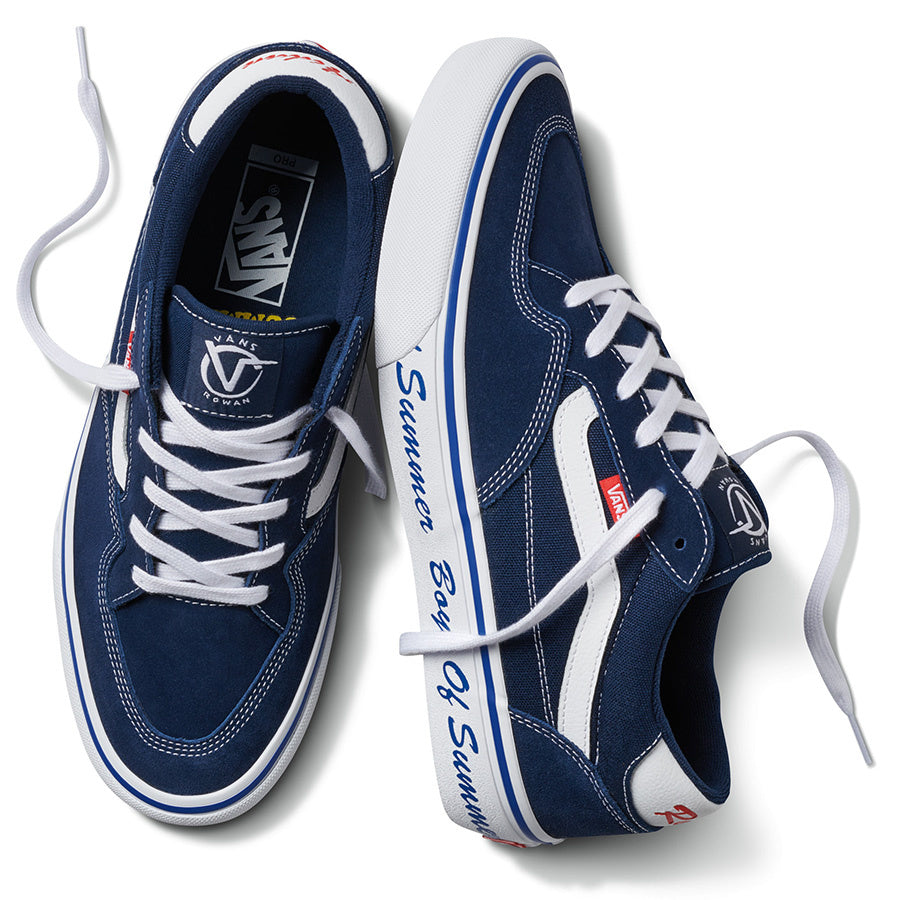 A pair of blue and white VANS BOYS OF SUMMER ROWAN PRO LTD AIDEN shoes.