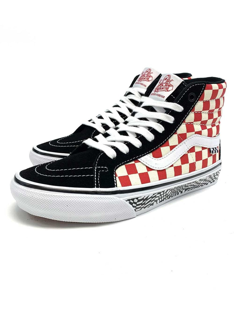 VANS SKATE SK8-HI REISSUE GROSSO '84 RED CHECKER is a stylish skate shoe featuring an eye-catching checkerboard design.