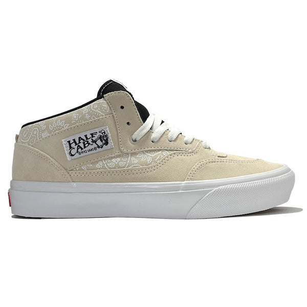 Cream and black VANS SKATE HALF CAB '92 BAKER BANDANA / KHAKI sneakers, featuring the iconic Vans skate design.