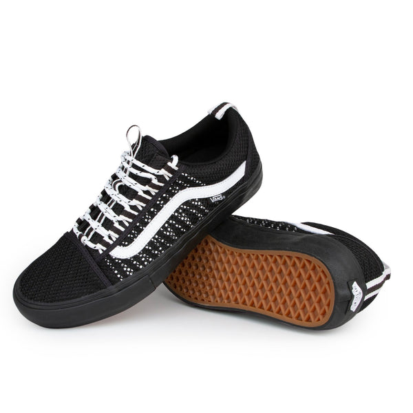 Vans Old Skool Sport Pro sneakers in black and white.