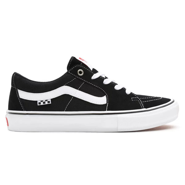 Black and white VANS SKATE SK8-LOW shoes.