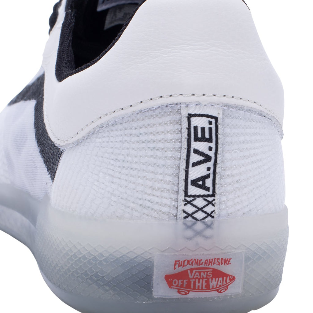 An VANS FUCKING AWESOME AVE ULTIMATE WAFFLE EXP BLACK / WHITE sneaker with the word ave on it.