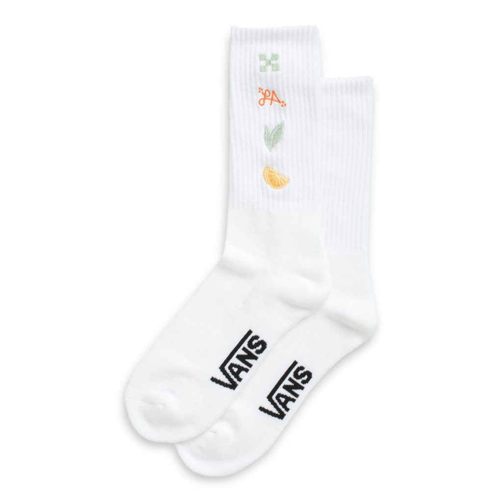 A pair of white VANS LIZZIE ARMANTO CREW SOCKS with fruit and vegetables on them, made with COOLMAX breathable yarn.