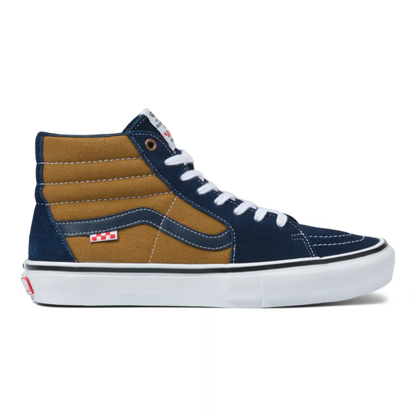 The VANS REYNOLDS SKATE SK8-HI NAVY / GOLDEN BROWN is a classic skate shoe.