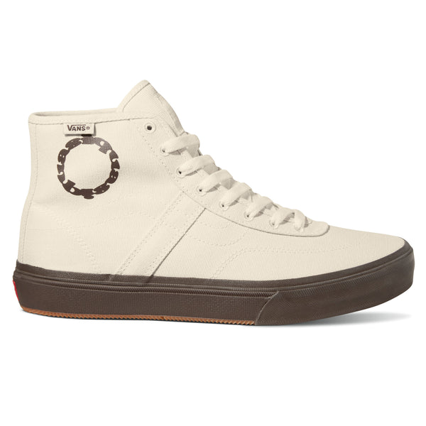 A VANS SKATE X QUASI CROCKETT HIGH DECON WHITE sneaker with a brown sole.