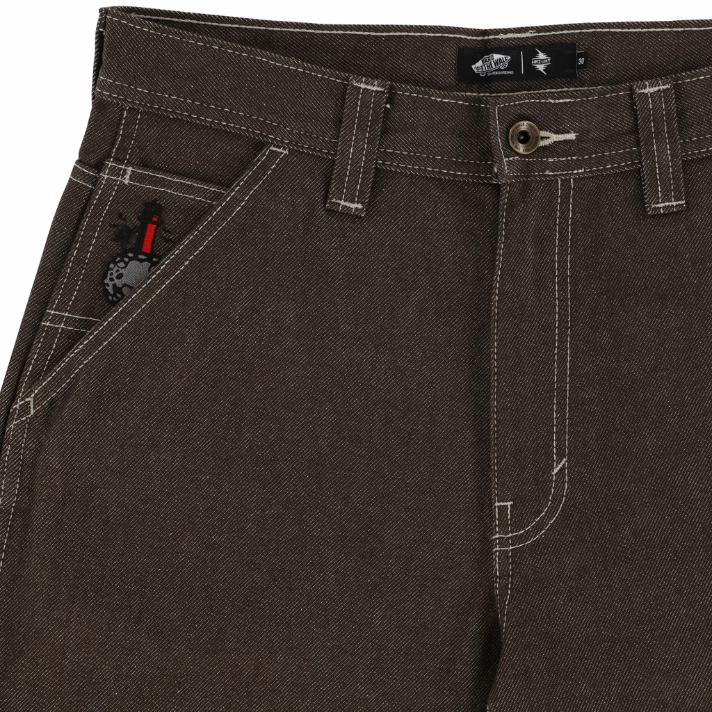 A close up of a pair of VANS ZION WRIGHT LOOSE DENIM CARPENTER PANT DEMITASSE BLACK pants.