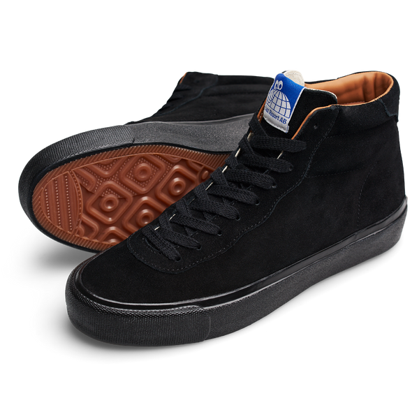 A Last Resort AB black high top sneaker with a gum sole.