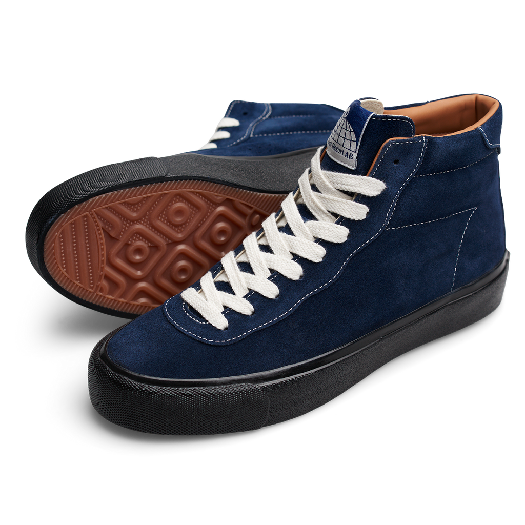 A pair of LAST RESORT AB VM001 HI SUEDE NAVY/BLACK high top sneakers with black soles from the Last Resort AB collection.