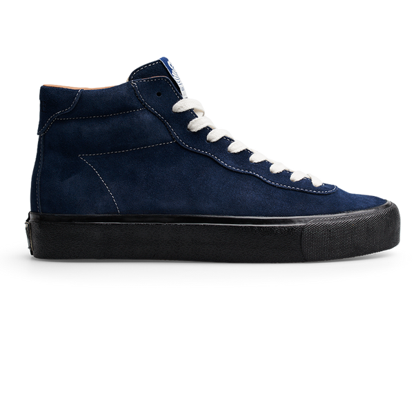 A LAST RESORT AB navy suede high top sneaker with black soles.