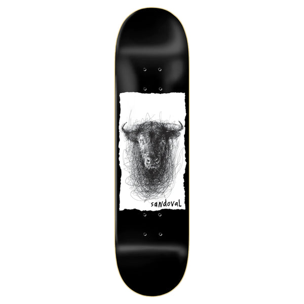 A black ZERO skateboard with a picture of a bear on it.